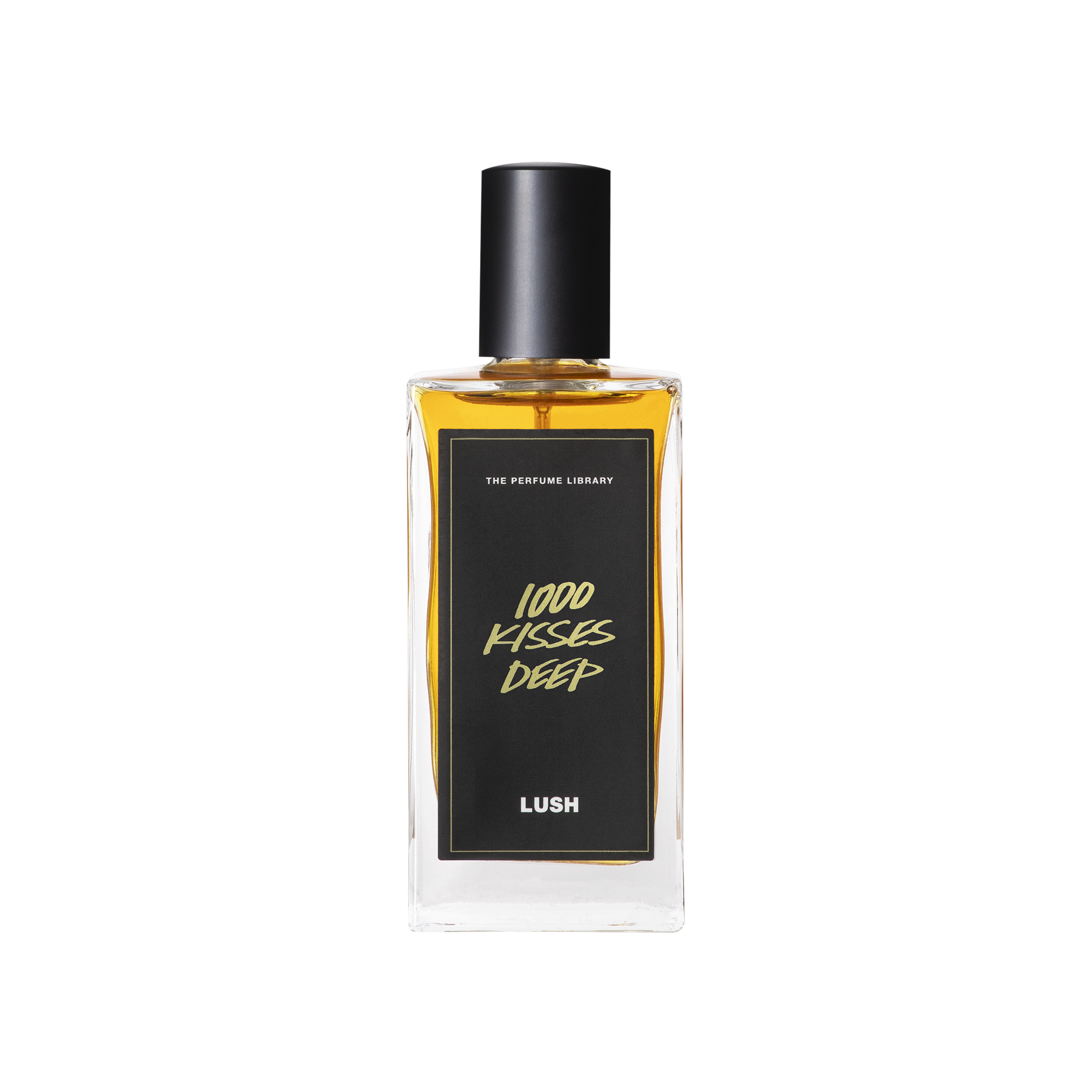 A glass perfume bottle filled with amber liquid. A black label reads 'The Perfume Library' and '1000 Kisses Deep'.