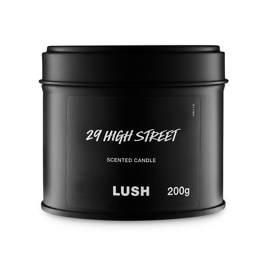 29 High Street. A round, black, candle tin with a removable lid. The black label on the front reads "29 High Street" in white text.