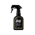 Big body spray. A black spray bottle of Lush "Big" Body Spray. The product label is black with a pale yellow banded border. White text states the product name and the scent description.