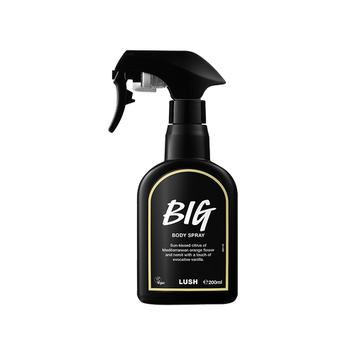 Big body spray. A black spray bottle of Lush "Big" Body Spray. The product label is black with a pale yellow banded border. White text states the product name and the scent description.