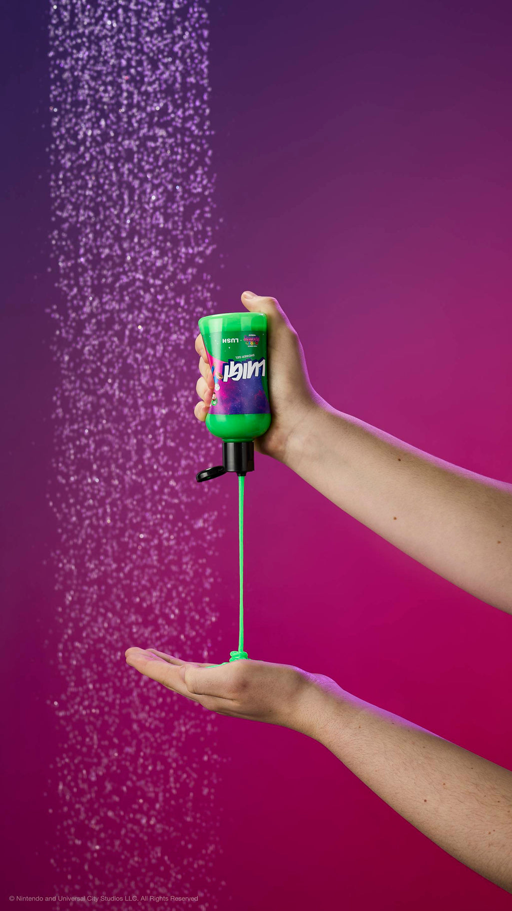 Vibrant green gel pours from a Luigi shower gel bottle into an open hand under a shower spray. Set against a purple-magenta gradient background.