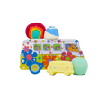 Magic Bus. A gift set featuring a psychedelic camper van tin product holder with wheels. Four Lush bathing products sit around it, including two bubble bars and two bath bombs.