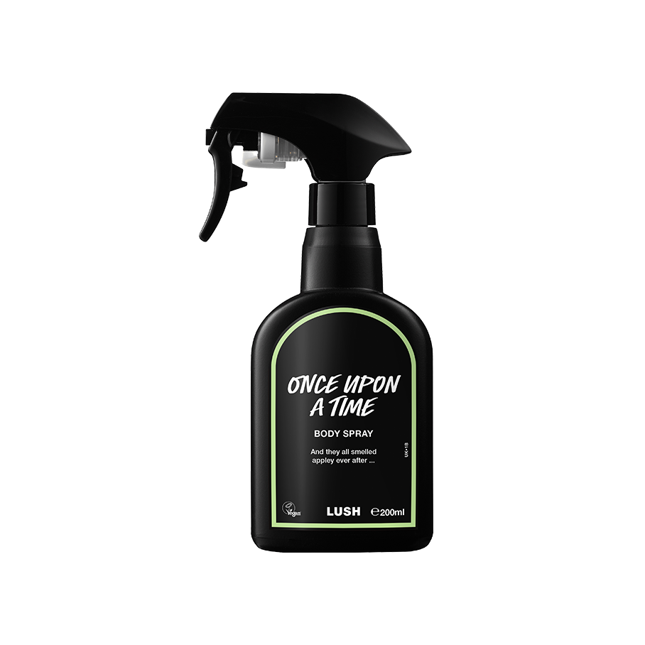 Once Upon A Time body spray. A black spray bottle of Lush "Once Upon A Time" Body Spray. The product label is black with a pale green banded border. White text states the product name and the scent description.