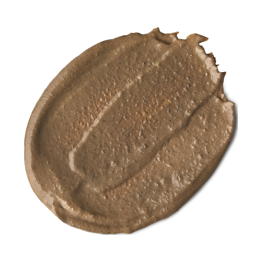 Ayesha. A round swatch of creamy, brown, visibly-textured face mask.