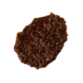 Banana. A smudged swatch of thick, textured shampoo. It is a rich hazelnut-brown colour with an almost treacle-like consistency and a lot of texture.