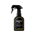A black spray bottle of Lush 'Banoffee Pie' body spray. The label features white text with a yellow border. The bottle has a trigger spray nozzle and contains 200ml of product.