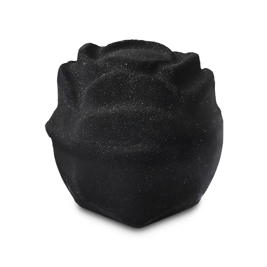 Black Rose bath bomb. A charcoal-grey bath bomb intricately shaped like a blooming rose. It features a shimmering layer of silver plastic-free glitter across the delicate, textured petals. Standing alone against a plain light grey background.