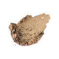 A textured swipe of Black Tea Mochi face mask on a light gray background. The thick, creamy beige formula is heavily speckled with crushed black tea particles throughout.