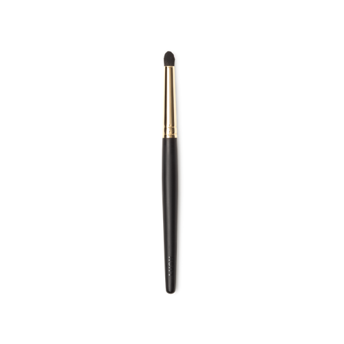 Blur In Love Brush. A small pencil brush, with circular brown bristles and a gold and dark wooden handle.