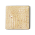 Buffy. A cream coloured, rounded square shaped, solid body butter, flecked with ground rice, almonds and aduki beans.
