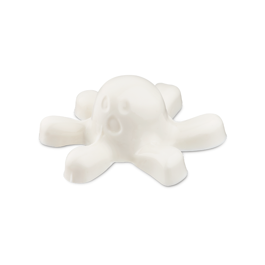Carefree Spirit. A smooth, glossy white shower jelly shaped like a cartoon ghost. It has a rounded central body with a moulded, surprised face featuring an open mouth and oval eyes, surrounded by six short, stubby legs.