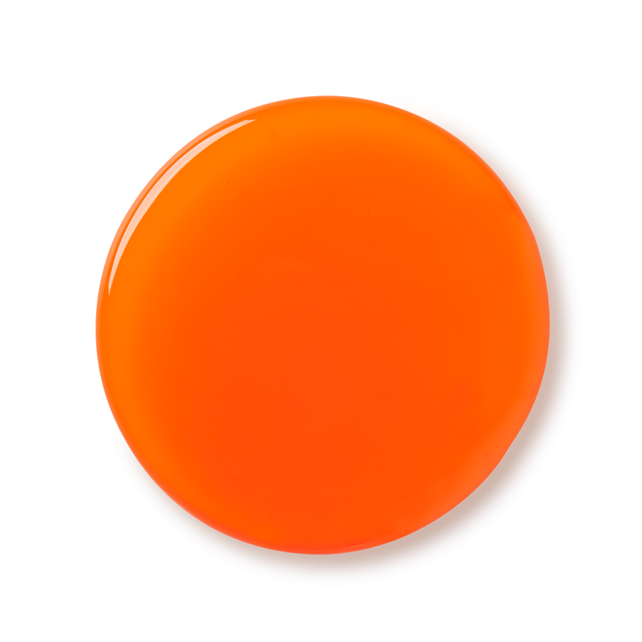 Celebrate. A perfectly circular swatch of glossy, vibrant, orange shower gel.