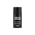 Chelsea Morning. A short, cylindrical black push-up tube of Chelsea morning solid perfume with a black label on the front covering the cap, with the product name and scent printed on it.