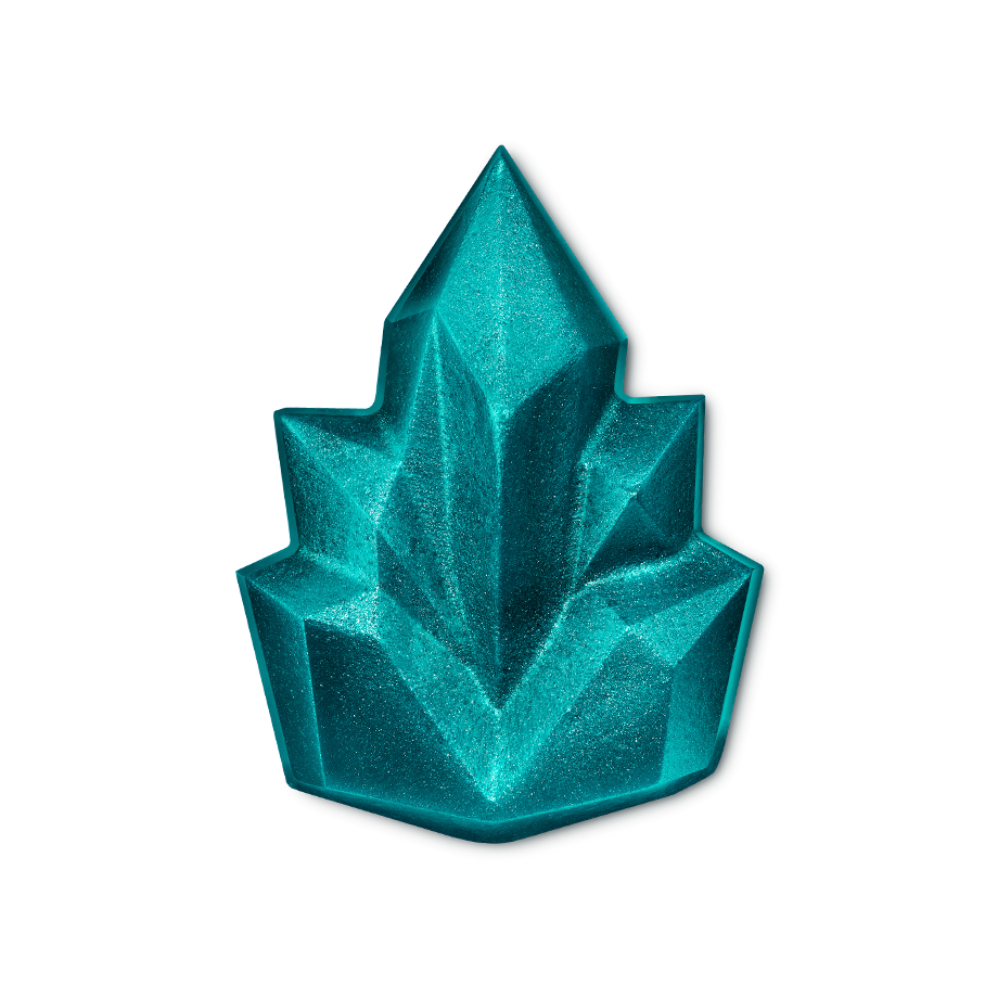 Cooling shower gummy. A shimmering teal-blue shower gummy is sculpted into a faceted, geometric crystal cluster shape. The angular structure has sharp lines and a glittering finish that catches the light.