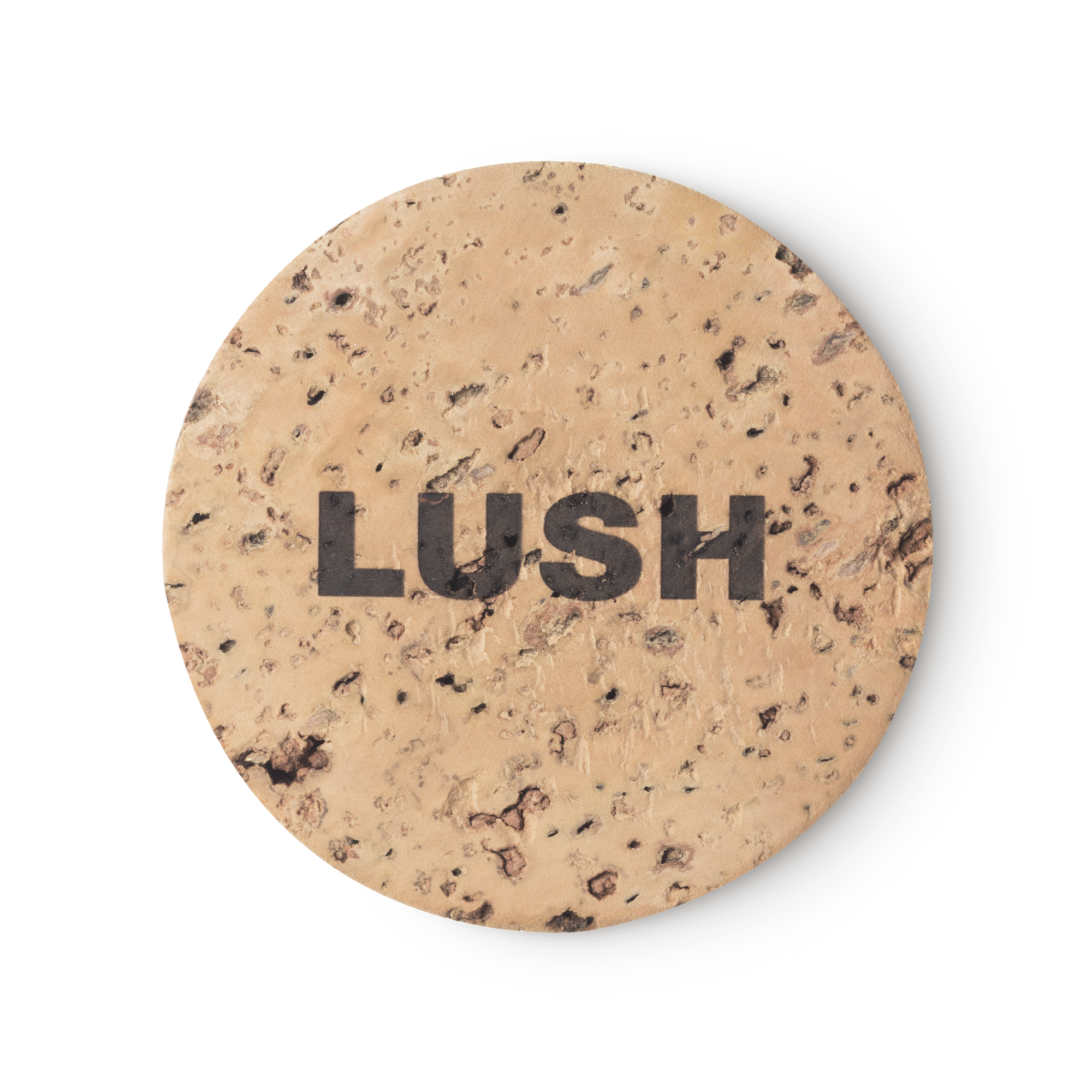 Cork Pot. A round, beige, product holder made of natural cork. LUSH is printed on top, in black, bold letters.