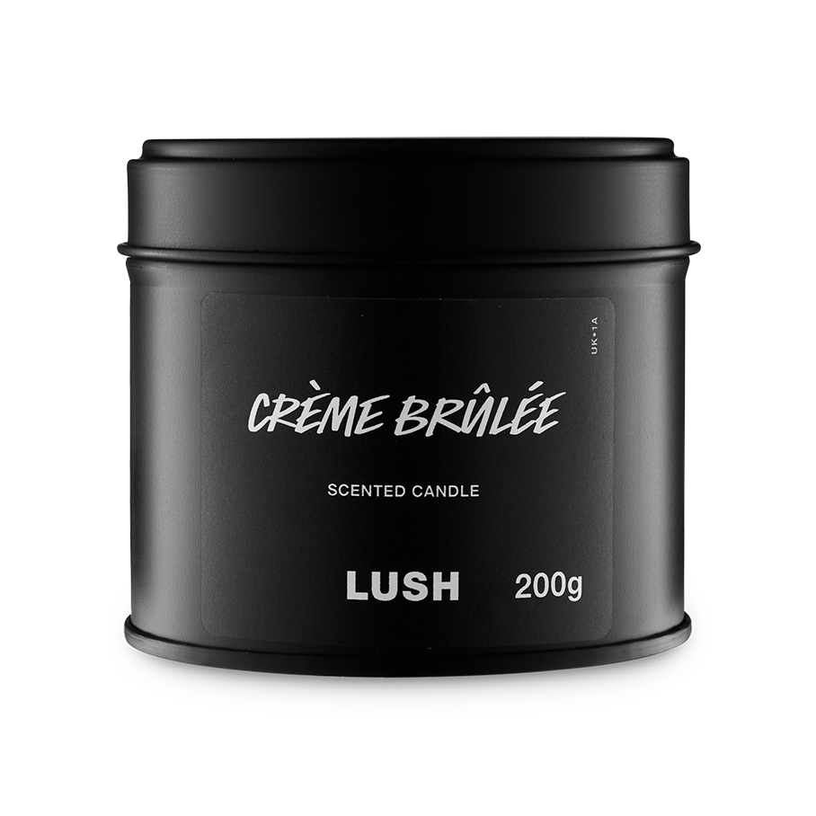Crème Brûlée. A round, black, candle tin with a removable lid. The black label on the front reads "Crème Brûlée Scented Candle" in white text.