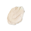 A swatch of smooth, thick, cream coloured Curl Power hair styling cream.