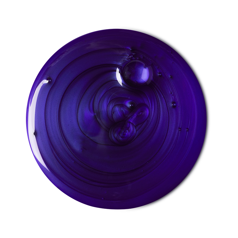 A sample of vibrant, deep purple, Daddy-O shampoo, swirled with tiny bubbles dotted throughout.