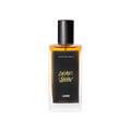 A glass perfume bottle filled with dark amber liquid. A black label reads 'The Perfume Library' and 'Dear John'.