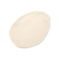 A swatch of smooth, thick, light cream coloured Dirty hair styling cream.
