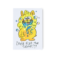 Don't Eat The Soap. A whimsical postcard depicting a friendly yellow monster eating blue soap with bubbles all around.