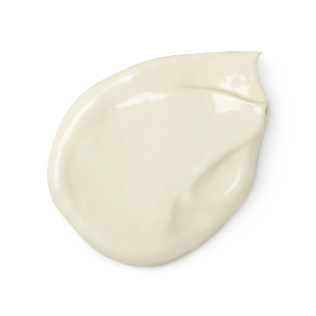 A swatch of cream coloured Dream Cream body lotion.