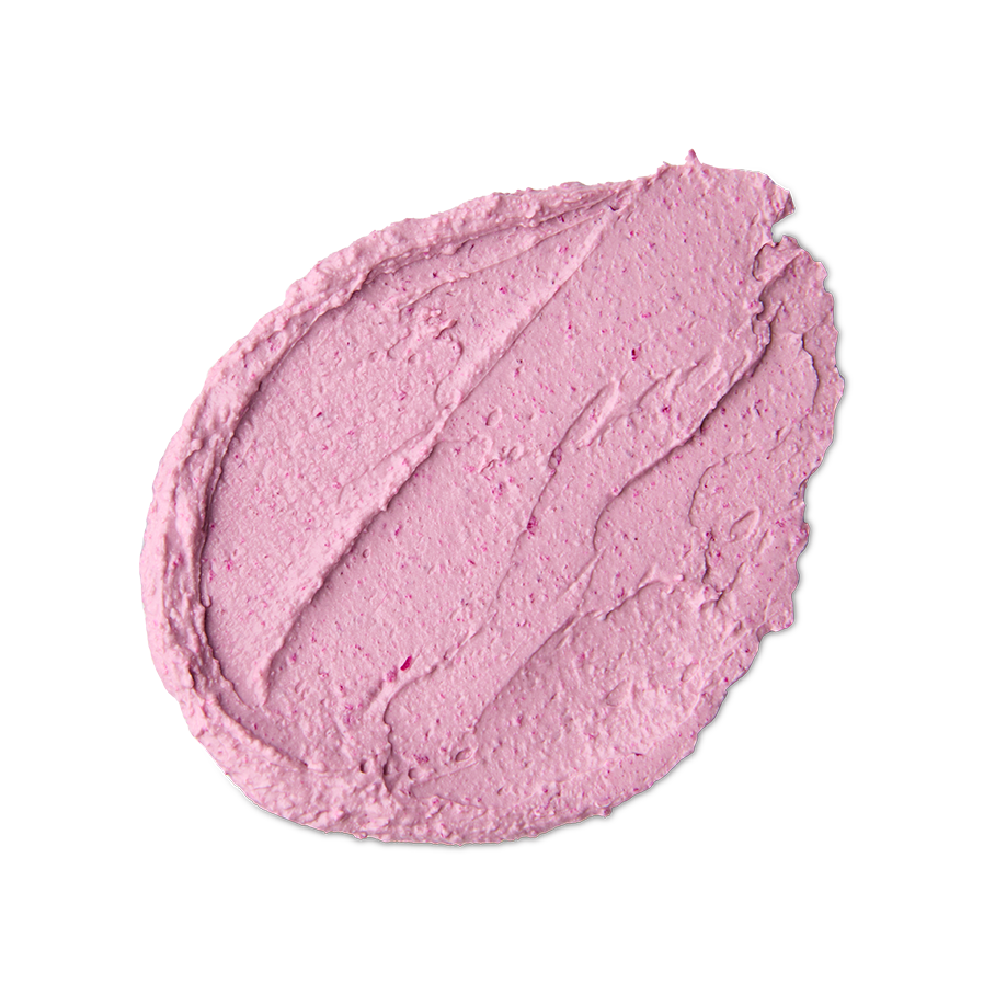 Family Face Time. A neatly smeared swatch of thick, light-pink, textured face mask with a matte finish, small flecks of dark pink, and visible swooping peaks from being spread.