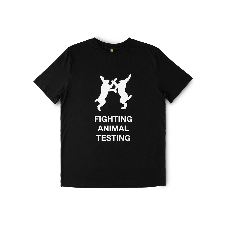 A black t-shirt with the white bunnies logo. The white print underneath reads: “Fighting Animal Testing”