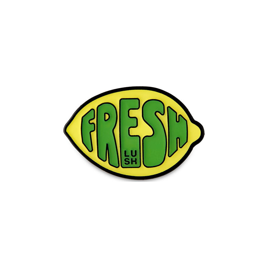 Fresh Values. A yellow, lemon-shaped metal badge with a black border and the word "FRESH" in green bubble letters.