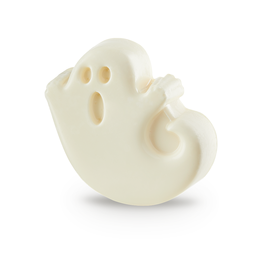 Ghost In The Dark. An off-white bar of soap sculpted into the shape of a cartoon ghost. The ghost has a rounded body, small waving arms, and hollowed-out oval shapes for two eyes and an open, surprised mouth.