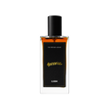 A glass perfume bottle filled with dark amber liquid. A black label reads 'The Perfume Library' and 'Goddess'.