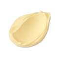 Honey, Beeswax And Almond Oil. A neatly smudged swatch of creamy, soft, ivory-coloured facial cleanser.
