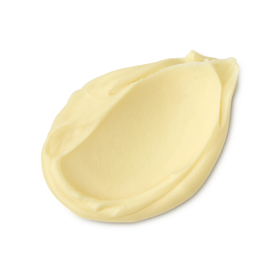 Honey, Beeswax And Almond Oil. A neatly smudged swatch of creamy, soft, ivory-coloured facial cleanser.