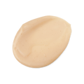 A swatch of smooth, thick, peachy beige coloured Jasmine and Henna hair treatment, with tiny brown flecks.