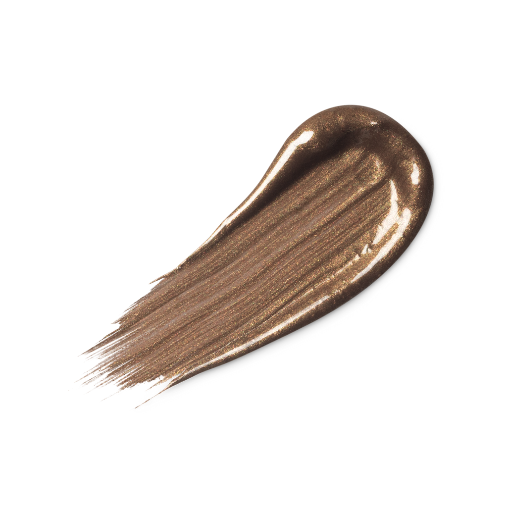A swatch of shimmery bronze liquid eyeliner.