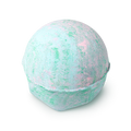 Lakes. A round bath bomb, delicately coloured baby blue and flecked with pastel green and baby pink.