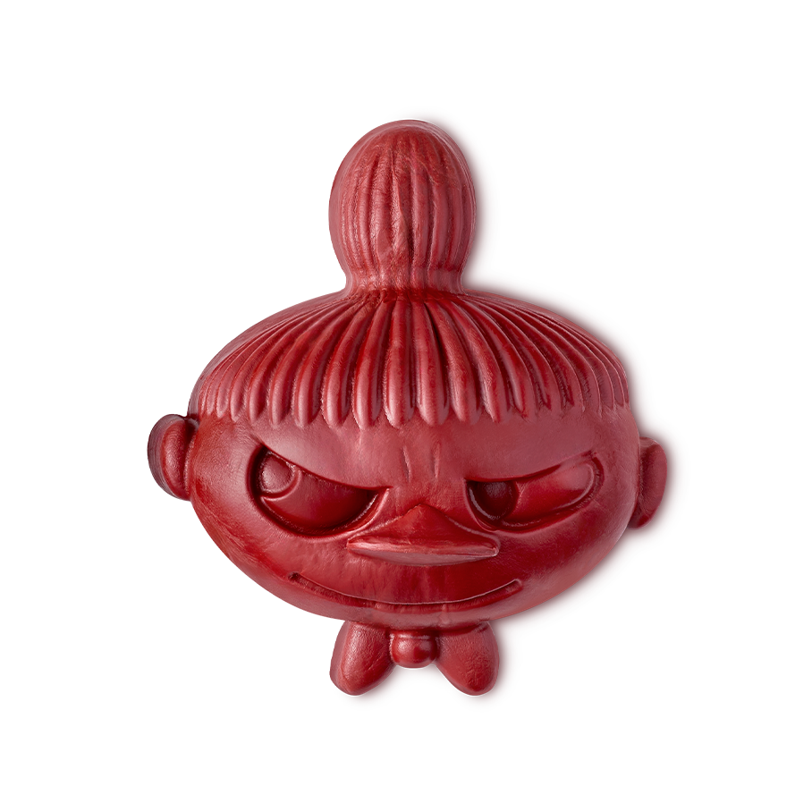 Little My soap. A dark red, matte product shaped like the head of the Moomin character Little My, featuring her signature topknot hairstyle and a mischievous expression.