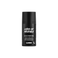 Lord of Misrule. A short, cylindrical black push-up tube of the Lord of Misrule solid perfume with a black label on the front covering the cap, with the product name and scent printed on it.