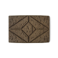 Marron Henna. A brown rectangular block of solid henna hair colour, with a floral design and the letter M pressed on the top.