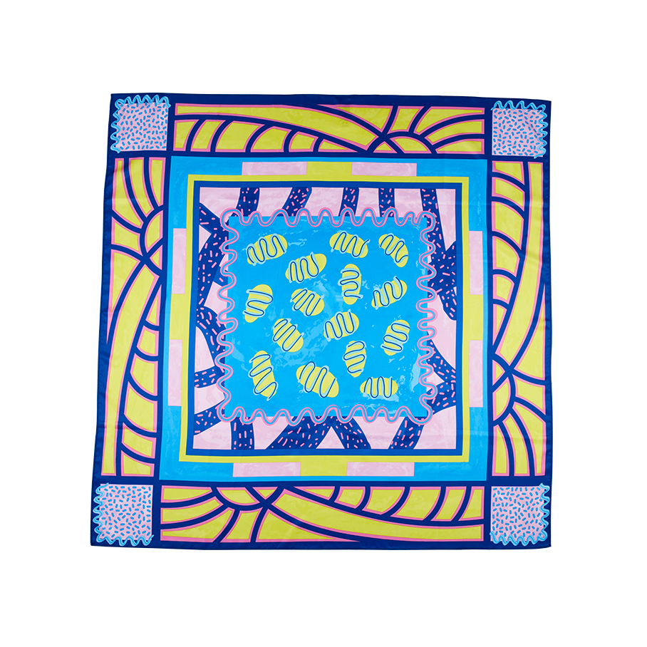 Metamorphosis. A Vibrant knot wrap with an abstract, yellow border with lots of bold design with pink and blue shapes.