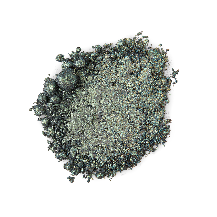 Meteor Glitter Crumble. A neatly smudged swatch of crumbly, shimmering,deep-sage-green, metallic eyeshadow.
