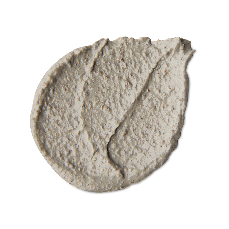 Movis. A neatly smeared swatch of coarse, pebbled-textured face mask with small, darker flecks.