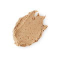 Nutkins. A neatly smudged swatch of thick, textured, caramel-coloured face mask with flecks of finely ground nuts.