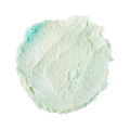 A swatch of original formula Ocean Salt; a cream and light blue swirled, salt-filled scrub.