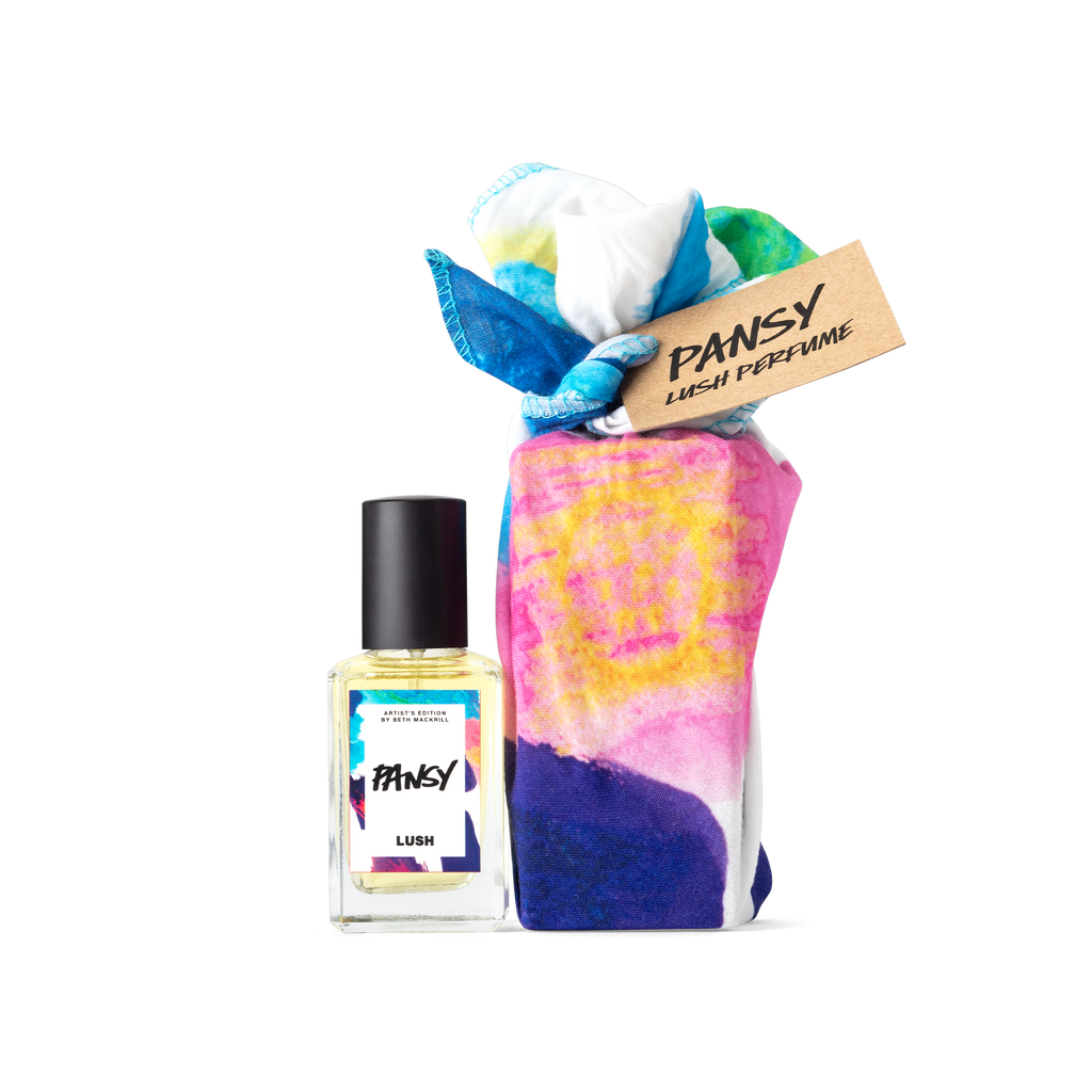 Pansy. A perfume bottle, wrapped in an artistic white, blue, pink, purple and orange knot wrap, complete with a brown gift tag.