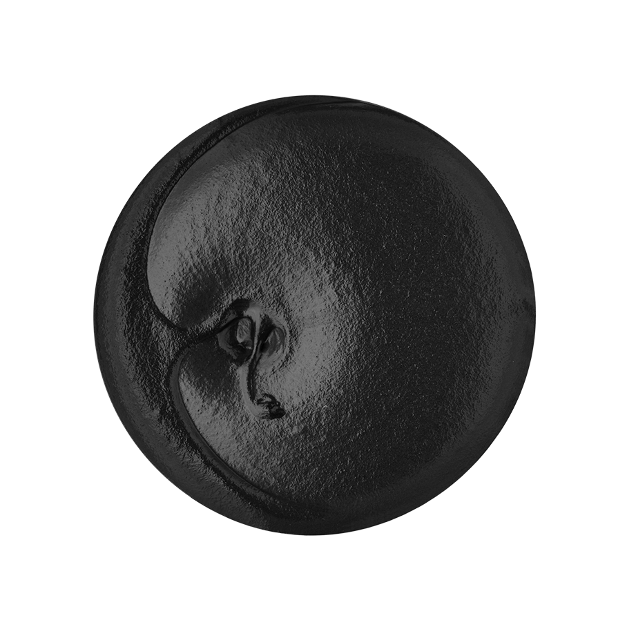 Plaque Sabbath. A perfectly circular swatch of matte, black, textured toothpaste.