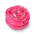 Rose Jam Bubbleroon. Round and pink with a rose shaped glittery top.
