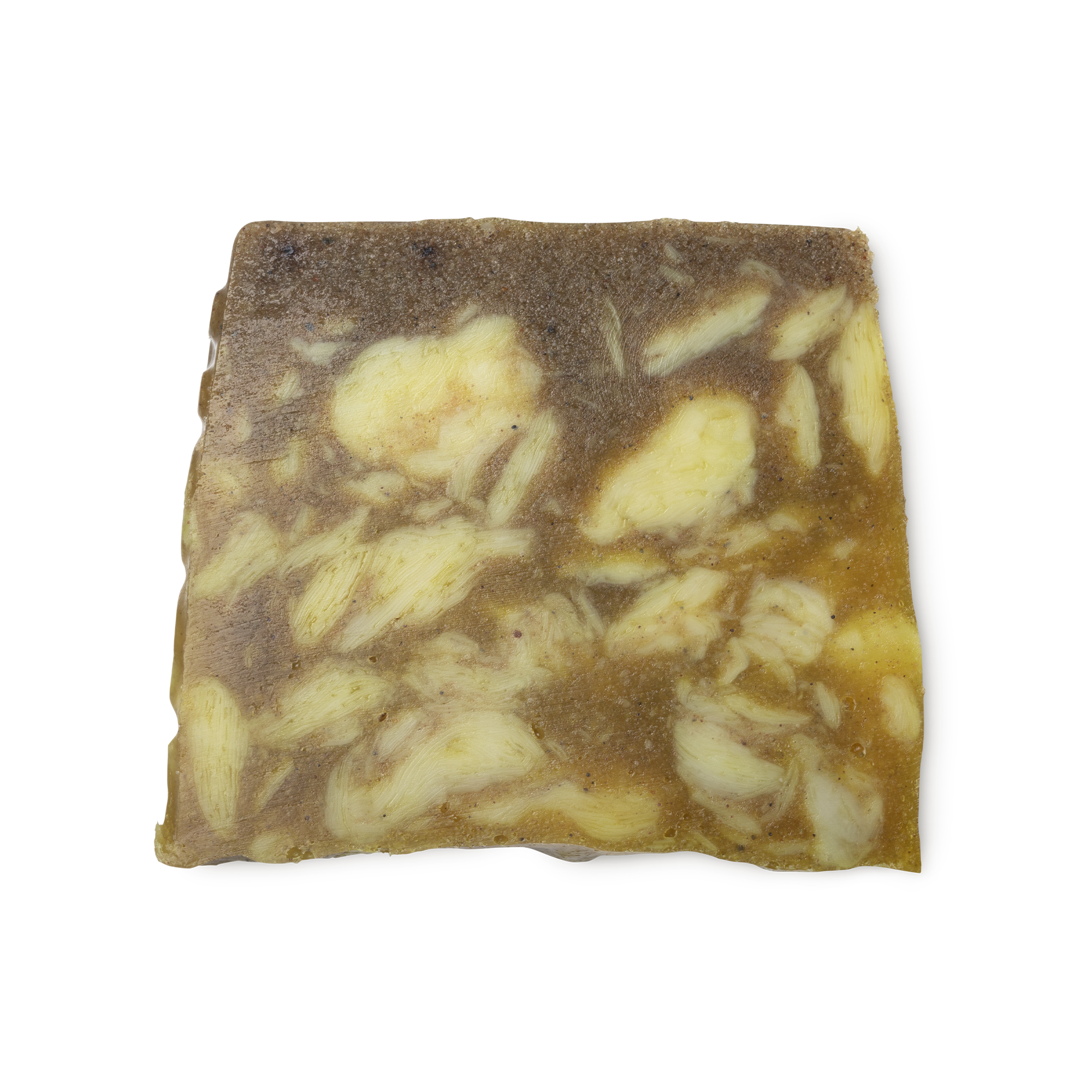 Sandstone. A sandy yellow coloured, trapezium shaped soap, with a roughly textured surface and bumps along its left side.