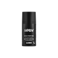 Shade. A short, cylindrical black push-up tube of the Shade solid perfume with a black label on the front covering the cap, with the product name and scent printed on it.
