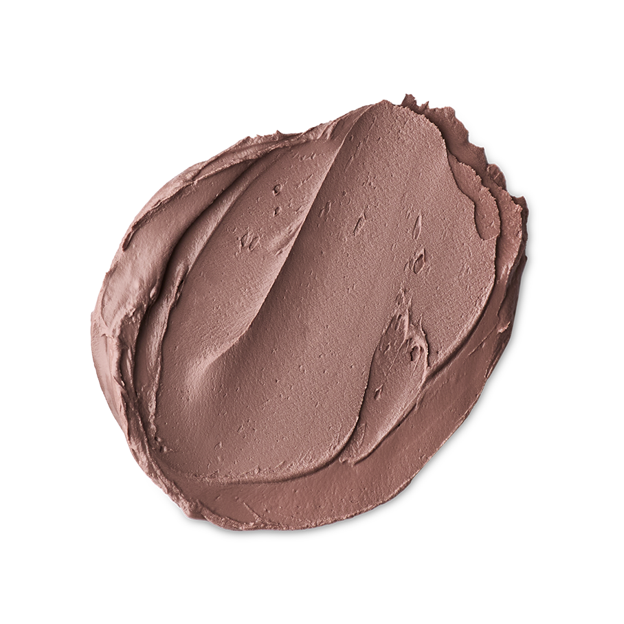 A textured, creamy swatch of the Sipak face mask in a muted mauve-brown shade. The swatch shows thick ridges and a smooth finish against a solid black background.